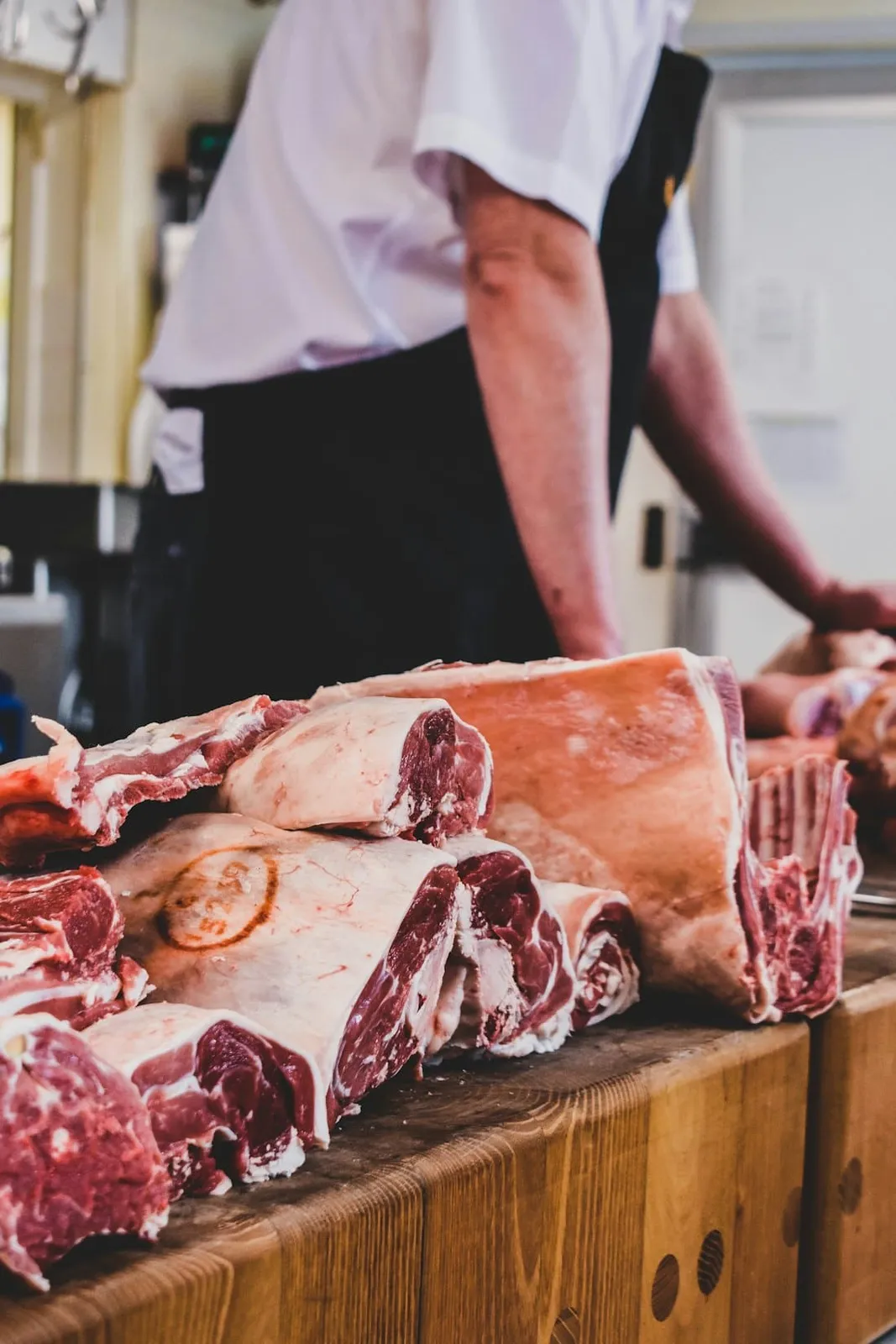 Cuts of meat on a butcher’s wooden block